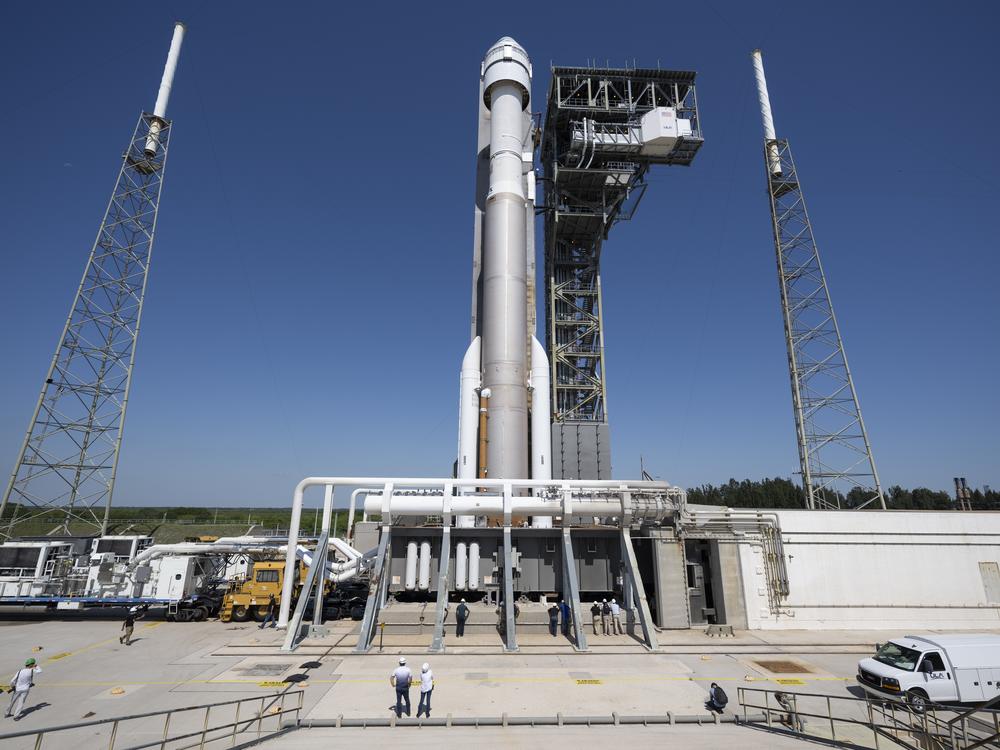 A United Launch Alliance Atlas V rocket with Boeing's Starliner spacecraft aboard is rolled to the launch pad on Thursday ahead of the NASA's Boeing Crew Flight Test.