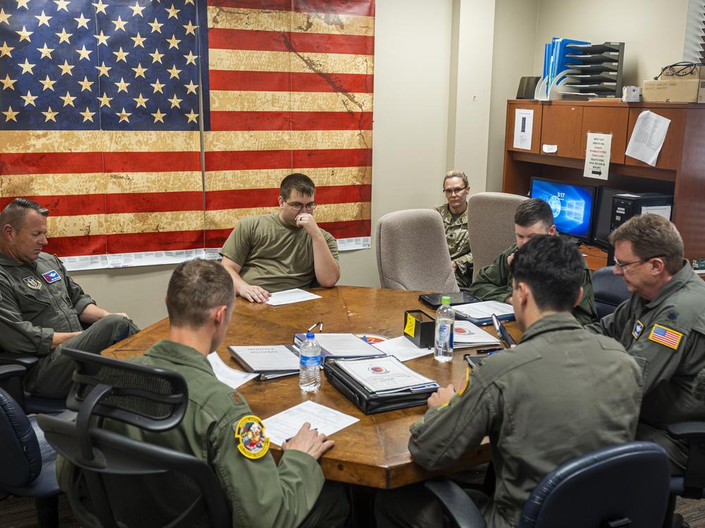 Hurricane Hunter airmen prepare before a weather reconnaissance training flight at Keesler Air Force Base. 