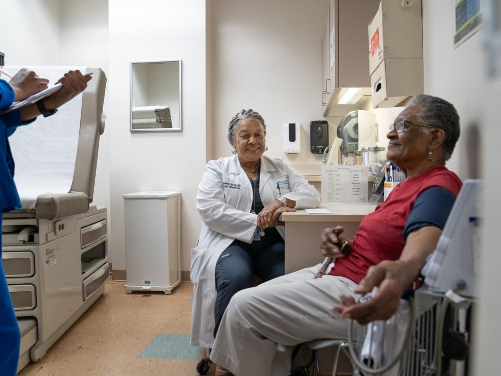 Dr Catherine E Burley sees patient Dorothy Wright at The Family Health Center at West End in Atlanta. 