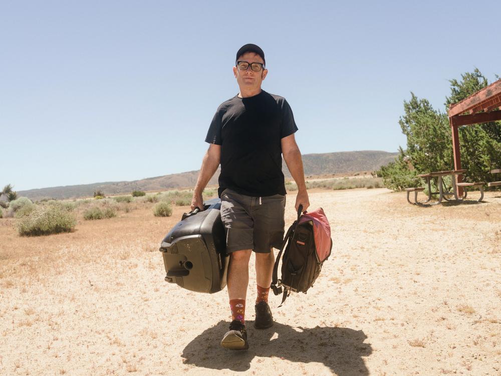 Kildall needs a speaker and a bag of equipment on site to make his music. 