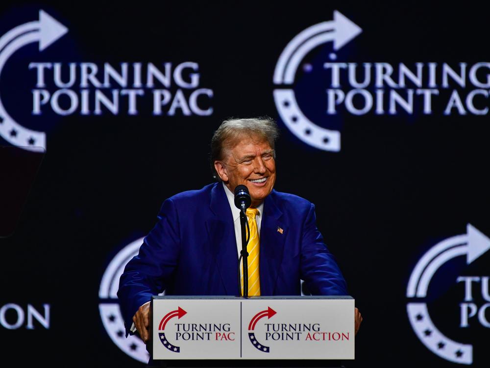 Former President Donald Trump speaks at Dream City Church in Phoenix on Thursday. The event with Turning Point USA brought the presumptive Republican nominee back to the crucial swing state for the first time in two years. 