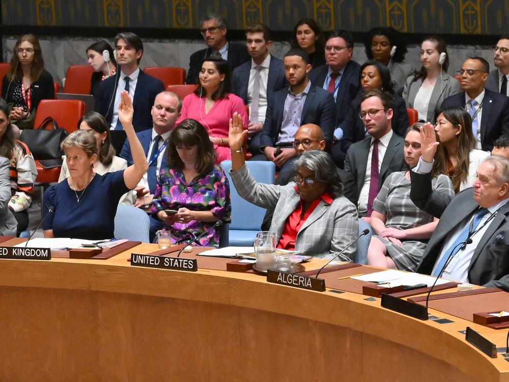 U.S. Ambassador to the United Nations Linda Thomas-Greenfield (center) votes during a U.N. Security Council meeting on the situation in the Middle East at U.N. headquarters on Monday. The Security Council adopted a U.S.-drafted resolution supporting a cease-fire plan in Gaza.