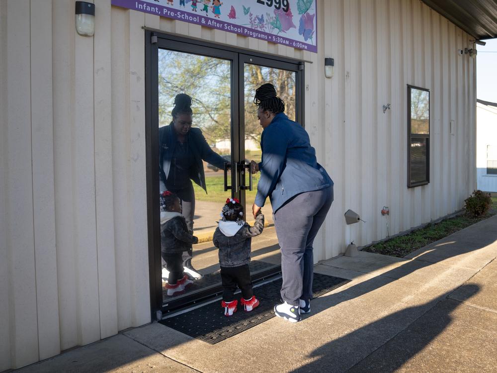 On her way to work at the Mazda Toyota Manufacturing plant in northern Alabama, D'Koya Mathis takes her 2-year-old daughter Zharia to Ms. Pat's Child Care & Development Center.