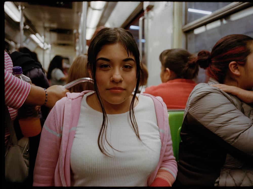 A young girl travels in the metro's women-only section in December 2023.