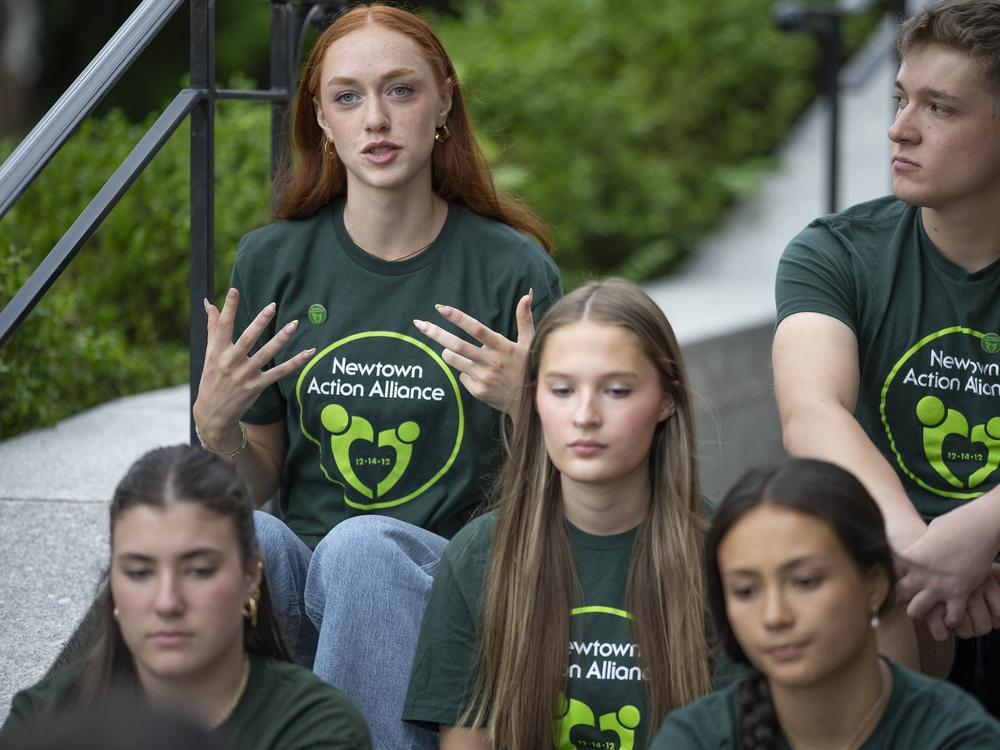 Ella Seaver shares her thoughts on high school graduation with other survivors of the 2012 Sandy Hook Elementary School shooting before a rally against gun violence on Friday, June 7, 2024, in Newtown, Conn.