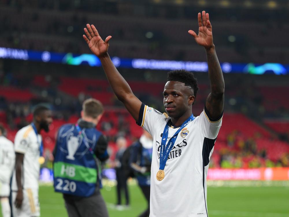 Vinicius Junior of Real Madrid acknowledges fans as he celebrates Real Madrid defeating Borussia Dortmund during the UEFA Champions League 2023/24 Final at Wembley Stadium on June 1. The Brazilian star was the target of racist chants last year -- an incident that sparked international outrage and has now resulted in prison terms. 