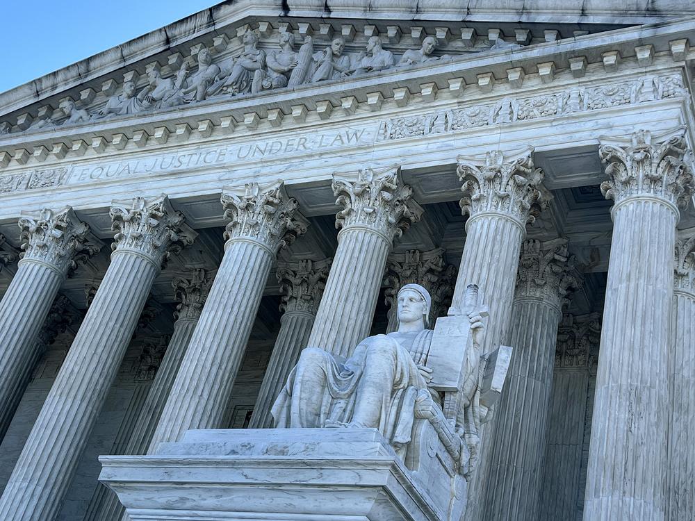 The statue Guardian or Authority of Law sits above the west front plaza of the U.S. Supreme Court on June 7 in Washington, D.C. Among the rulings the court is expected to issue by the end of June are cases about access to abortion pills dispensed by mail, gun restrictions, the power of regulatory agencies and former President Donald Trump’s bid to avoid criminal charges for trying to overturn his 2020 election defeat.