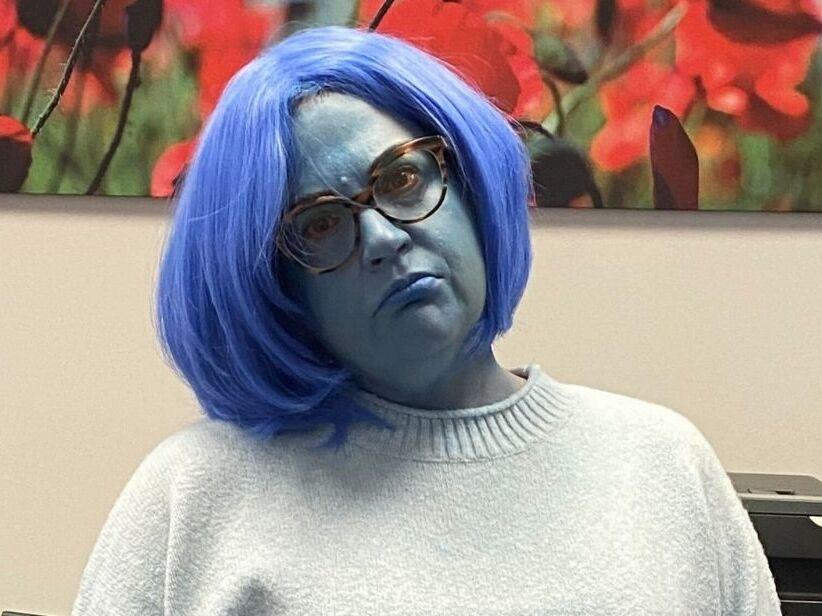Clinical social worker Kristi Zybulewski has dressed up as Sadness for Halloween. She says most of the kids she works with have seen <em>Inside Out</em>.
