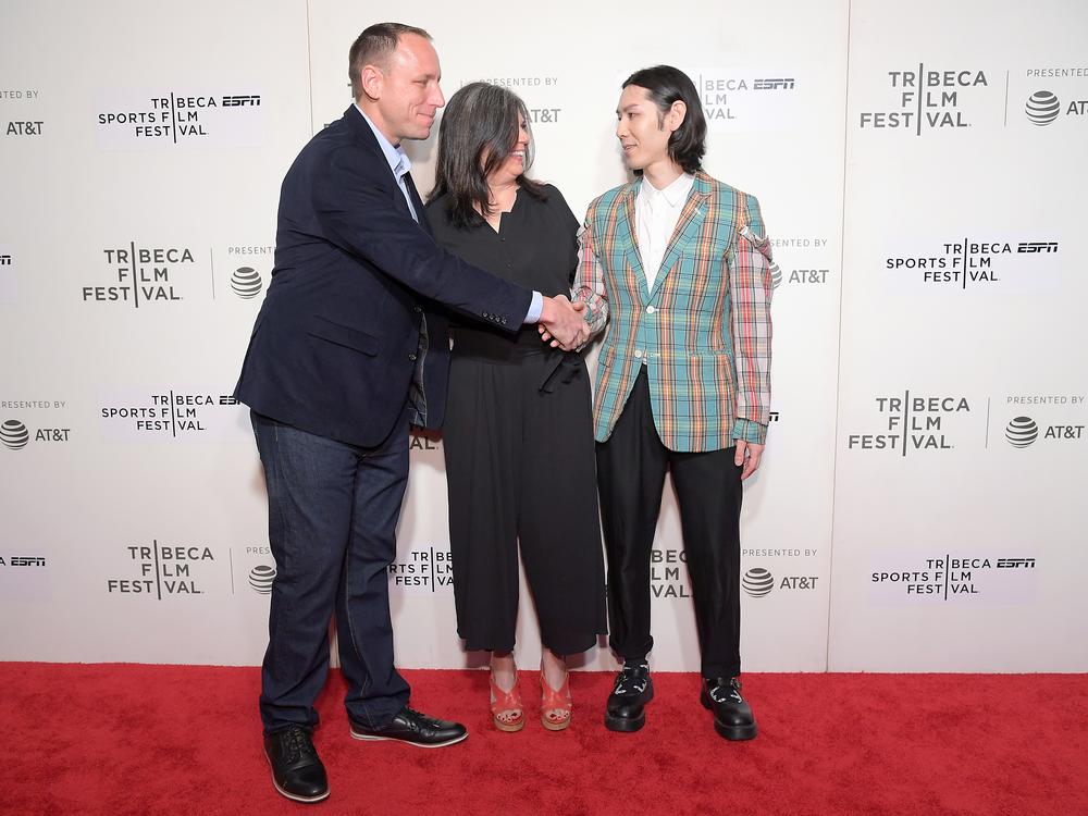 Director Nicole Lucas Haimes (C) and competitive eaters Joey Chestnut (L) and Takeru Kobayashi attend the World premiere of 