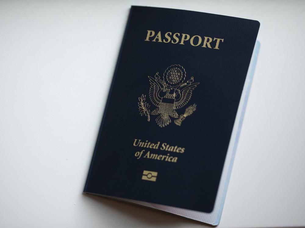 The cover of a U.S. Passport is displayed in Tigard, Ore., Dec. 11, 2021.