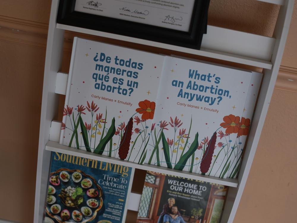 Books sit on a shelf at a clinic that provides abortion care on April 30, in Jacksonville, Fla. A six-week abortion ban that Florida Gov. Ron DeSantis signed went into effect on May 1.