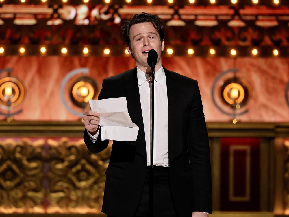 Jonathan Groff accepts the best leading actor in a musical award for <em>Merrily We Roll Along</em> onstage during The 77th Annual Tony Awards.