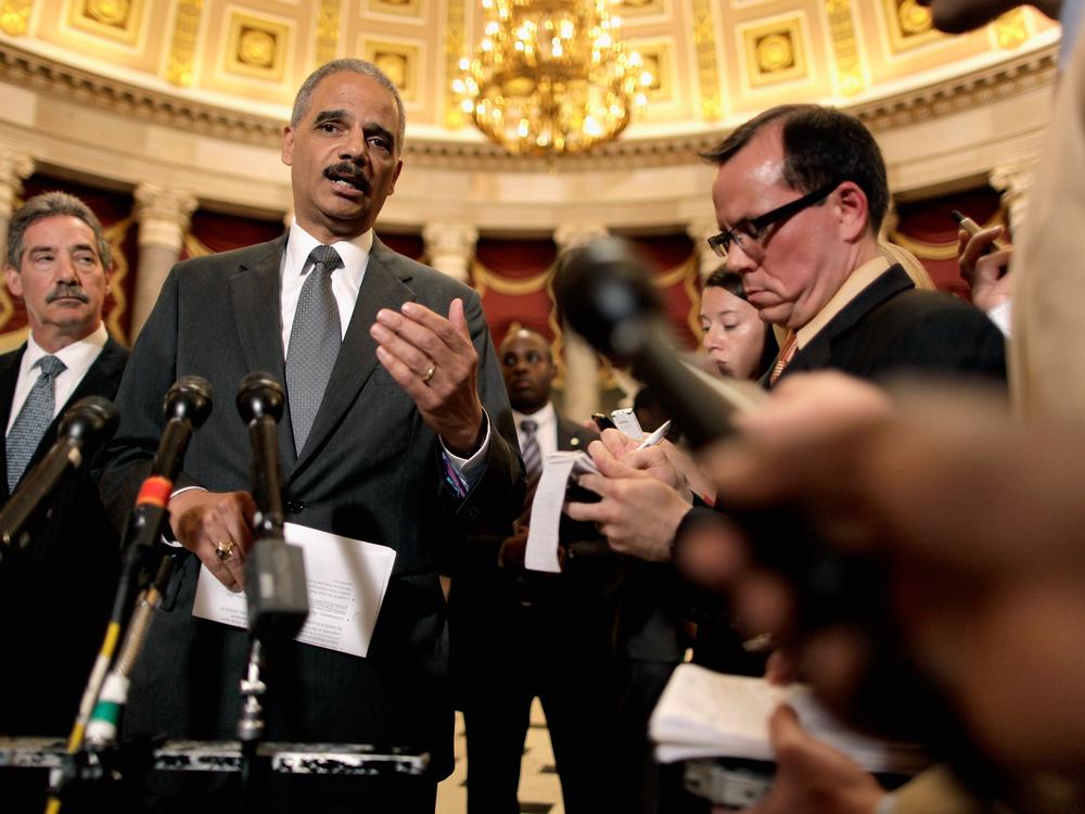 Attorney General Eric Holder talks to reporters after meeting with House Oversight and Government Reform Committee Chairman Darrell Issa in the U.S. Capitol June 19, 2012 in Washington, D.C. Issa and Holder did not appear to find any more common ground about the release of documents and the committee plans to move forward with a vote to hold Holder in contempt of Congress. 