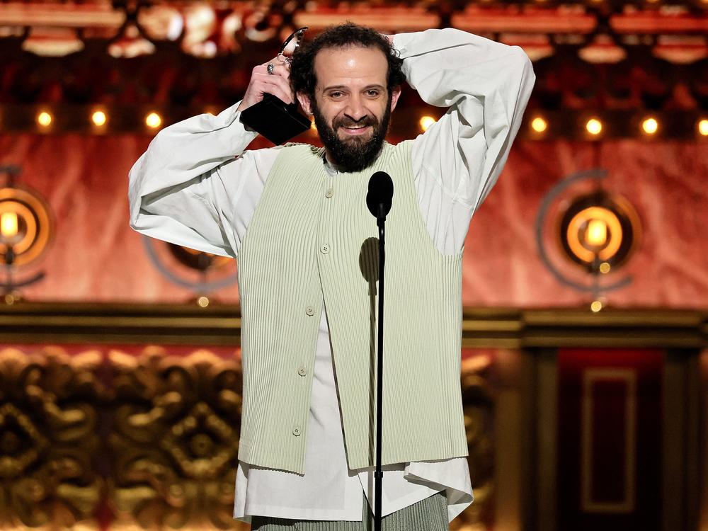 Will Brill accepts the best performance by an actor in a featured role in a play award for <em>Stereophonic </em>onstage during The 77th Annual Tony Awards.
