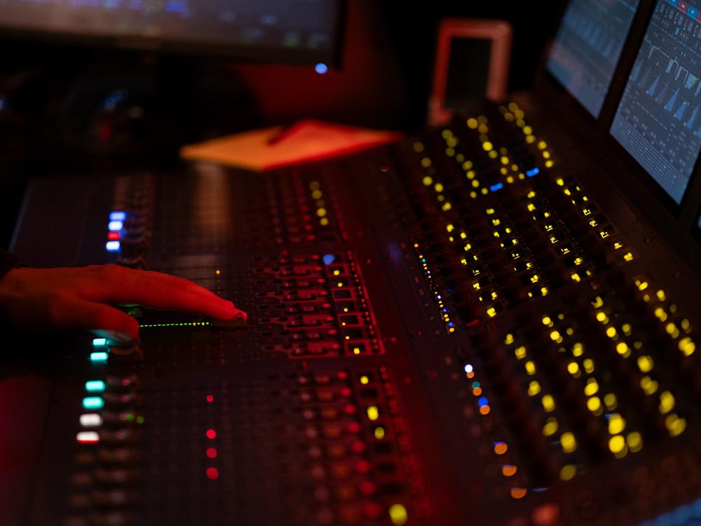 Broadway musical Hell's Kitchen’s sound mixer Sean Woods does his preparation for the evening show at the Shubert Theatre in New York, on Wednesday, June 12, 2024.