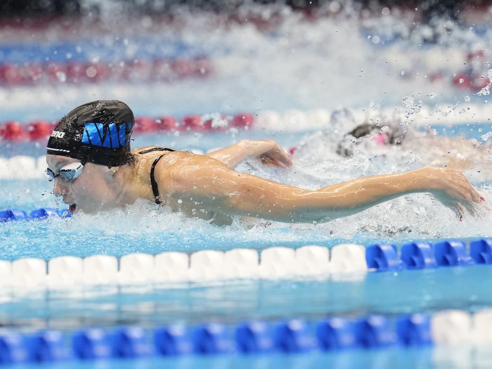 Gretchen Walsh swims during the Women's 100 butterfly finals on Sunday at the U.S. Swimming Olympic Trials in Indianapolis.