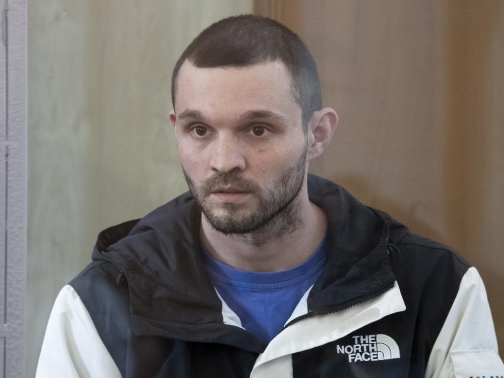 U.S. Army Staff Sgt. Gordon Black sits in a glass cage in courtroom in Vladivostok, Russia, on Wednesday.