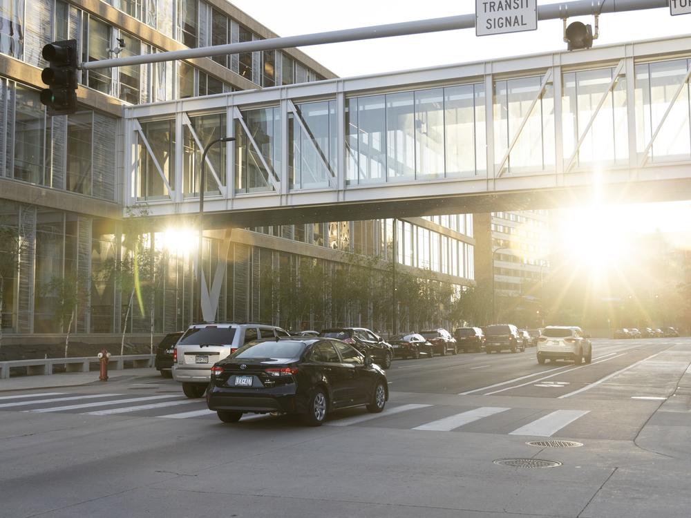 Rideshare vehicles share the road with other drivers in downtown Minneapolis.