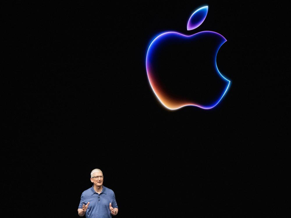 Apple CEO Tim Cook speaks during Apple's annual Worldwide Developers Conference (WDC) in June. Many of the features Apple announced there will duplicate the services of 3rd-party apps, a practice known as 