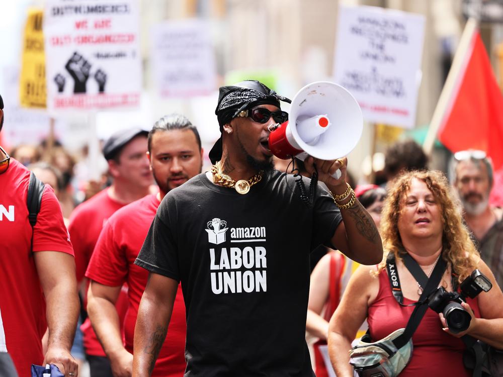 Amazon Labor Union President Chris Smalls leads a pro-union march in New York City in 2022. Workers at an Amazon warehouse on Staten Island voted to unionize that year, but they've since struggled to negotiate a contract with the company. 