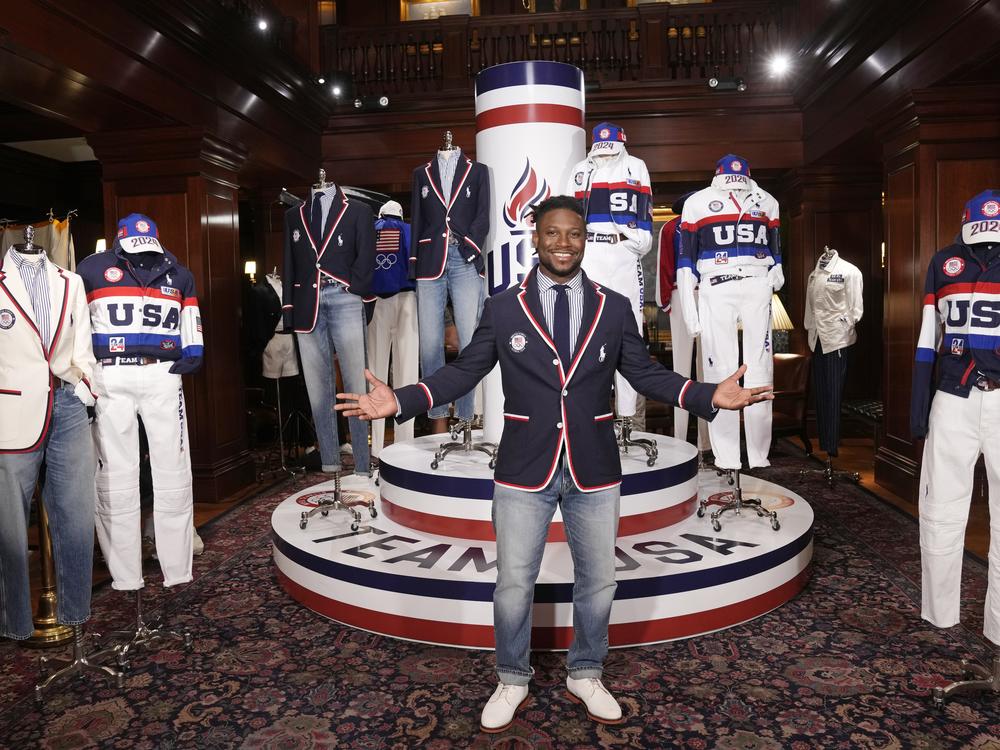 Olympic athlete in fencing, Daryl Homer, models the Team USA Paris Olympics opening ceremony uniform at Ralph Lauren headquarters on Monday in New York.