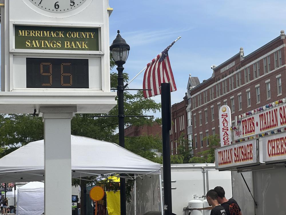 A bank clock overlooking the Market Days street fair in Concord, N.H., shows the temperature Thursday morning.