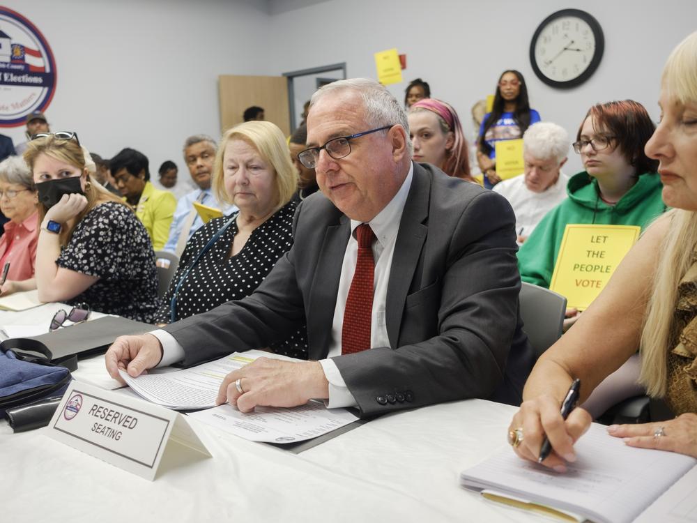 David Sumrall, the head of the Republican Party in Georgia's Bibb County, presents his case to challenge the eligibility of nearly 800 voters at a hearing in Macon in May.