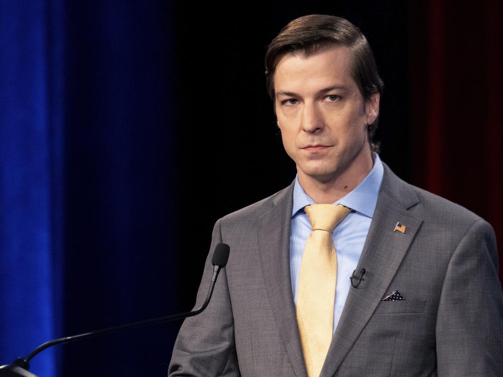 In this file photo from 2022, Libertarian Chase Oliver, then a candidate for Georgia's U.S. Senate seat, listens during a debate in Atlanta, Ga. The Libertarian Party nominated party activist Oliver for president as the party's candidate in the 2024 election, rejecting former President Donald Trump and Robert F. Kennedy Jr. after they each spoke at the party's convention. (AP Photo/Ben Gray, File)