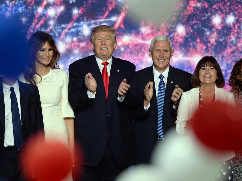 In 2016, Republican presidential nominee Donald Trump, left, and his running mate Indiana Gov. Mike Pence celebrate after accepting the nomination for president at the Republican National Convention in Cleveland.