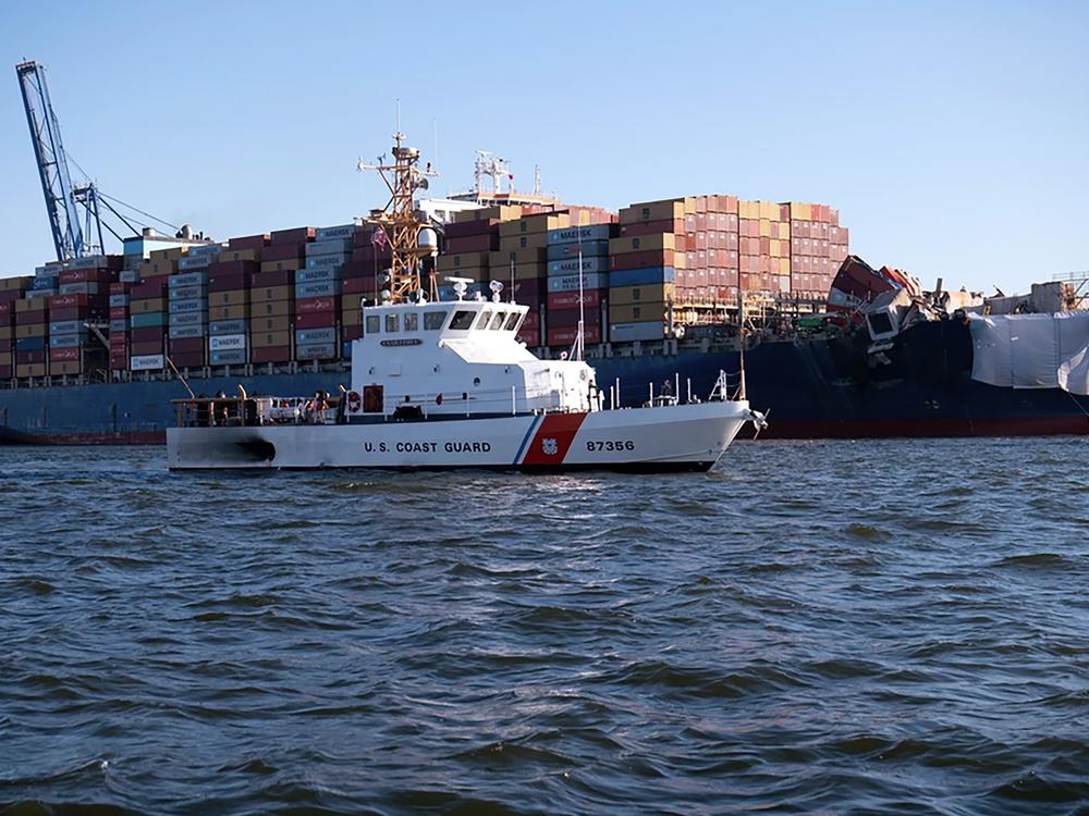 The U.S. Coast Guard Cutter Sailfish prepares to escort the MV Dali during its transit from the Port of Baltimore to the Port of Virginia in Norfolk on Monday, June 24, 2024.