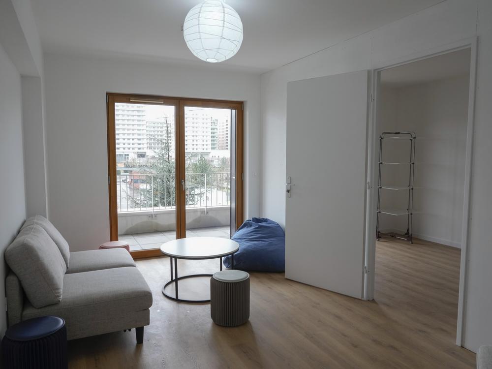 A living room in the Olympic Village, pictured in February. Thousands of athletes and officials will live there between July and September during the Olympics and Paralympics.