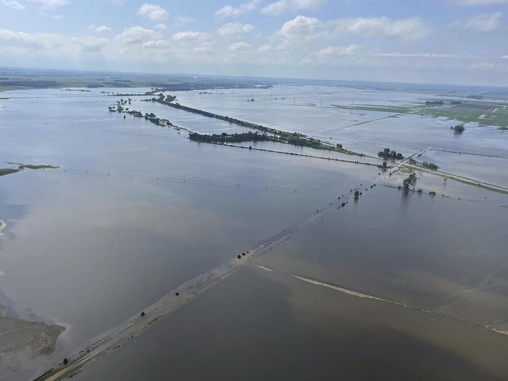 Heavy rains in recent days have submerged farmland near Vermillion, S.D., on Tuesday. Flooding has devastated communities in several states across the Midwest.