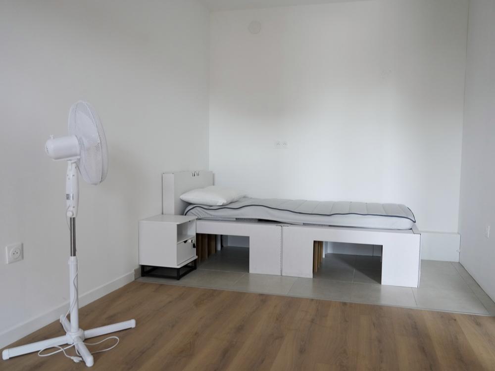 A bedroom of the Olympic Village in Saint-Denis, north of Paris, photographed in February. The buildings will be cooled with a system of water pipes beneath the floor, rather than air conditioning. 
