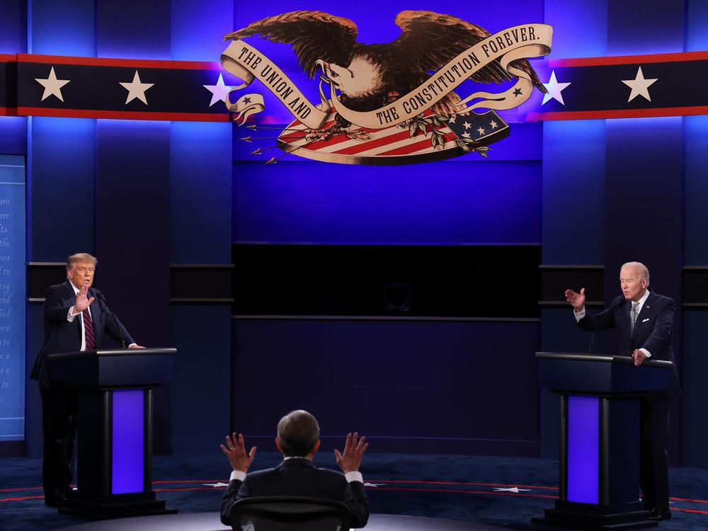 Then-President Donald Trump and then-Democratic presidential nominee Joe Biden participate in a presidential debate moderated by then-Fox News anchor Chris Wallace on Sept. 29, 2020, in Cleveland. This year, the first presidential debate will not have an audience but will have a mute button. 