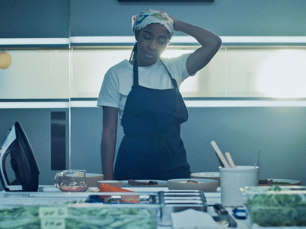 Ayo Edebiri as Sydney Adamu. 
