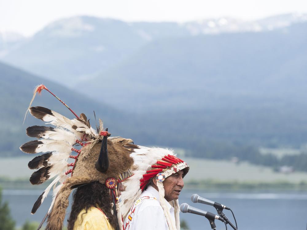 Arvol Looking Horse, a spiritual leader of the Lakota, Dakota and Nakota Oyate peoples in South Dakota, closes out a naming ceremony for a white buffalo calf at the headquarters of the Buffalo Field Campaign in West Yellowstone, Mont., on Wednesday.