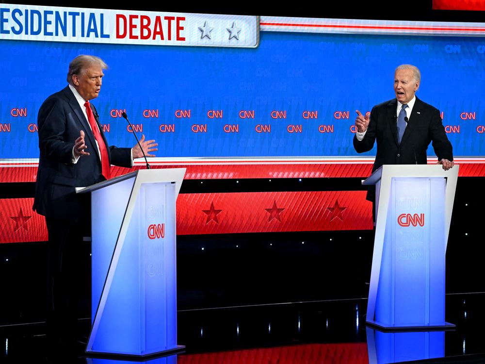 President Joe Biden and former President and Republican presidential candidate Donald Trump participate in the first presidential debate of the 2024 elections at CNN's studios in Atlanta, Georgia, on June 27, 2024. 