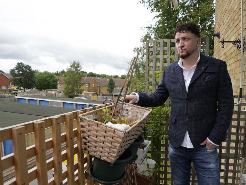 Dominic Watters, a single dad and founder of the Food is Care campaign, poses for a photo outside his home in Canterbury, England, June 10. Since calling an election, Prime Minister Rishi Sunak has campaigned saying the economy is turning a corner, inflation is down and things are looking up. But millions across the U.K. still feel the squeeze from high food, energy and housing prices.