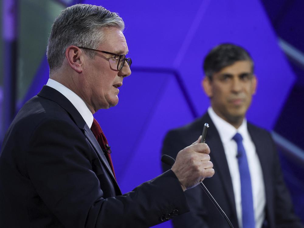 British Prime Minister Rishi Sunak (right) and opposition Labour Party leader Keir Starmer take part in a BBC debate, in Nottingham, England, on June 26.