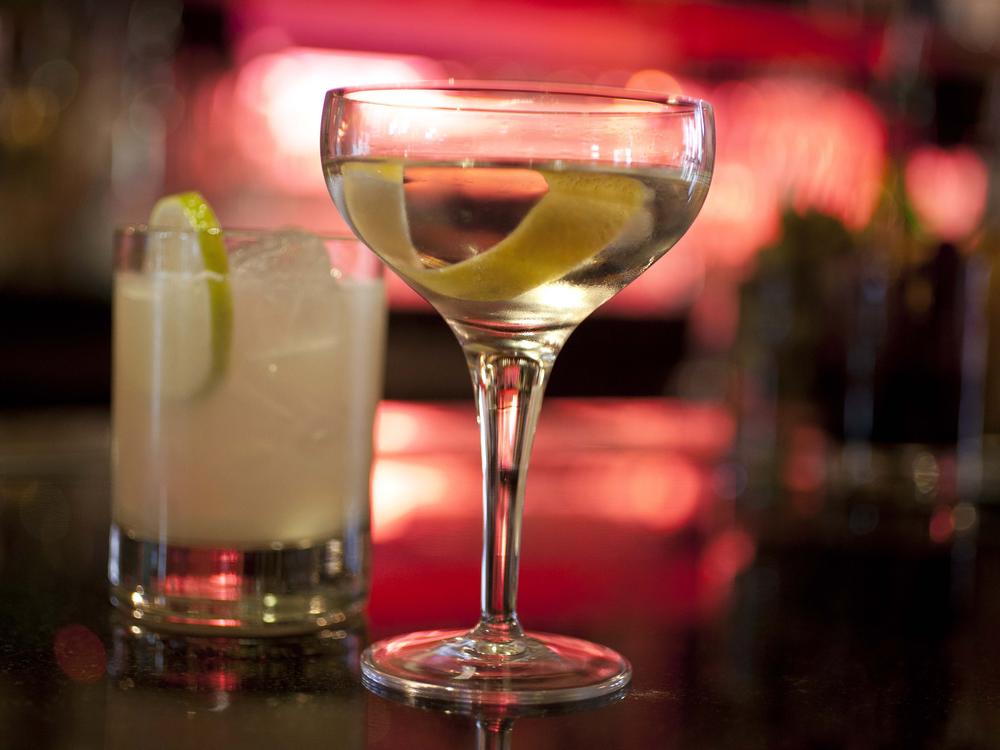 An agave Margarita and gin Martini made by mixologist Jacques Bezuidenhout sit on a bar in the Starlight Room of the Sir Francis Drake Hotel in San Francisco, Dec. 20, 2012.