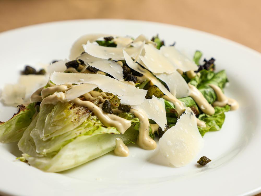The Caesar salad was born 100 years ago, on July 4, 1924, in Tijuana, Mexico. Above, the grilled romaine Caesar salad at<strong> </strong>Boucherie, a restaurant in uptown New Orleans. 