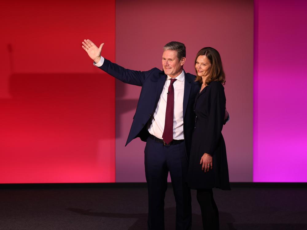 Keir Starmer and wife Victoria accept the applause of delegates following his keynote speech to the Labour conference for the first time as party leader on Sept. 29, 2021, in Brighton, England.