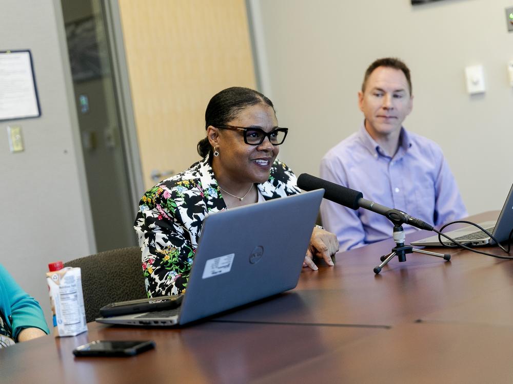 MDOT assistant deputy director Leslie Love, left, and MDOT senior project manager Jon Loree, right, discuss the design of the boulevard that will replace I-375 in Detroit, Mich., on May 17.