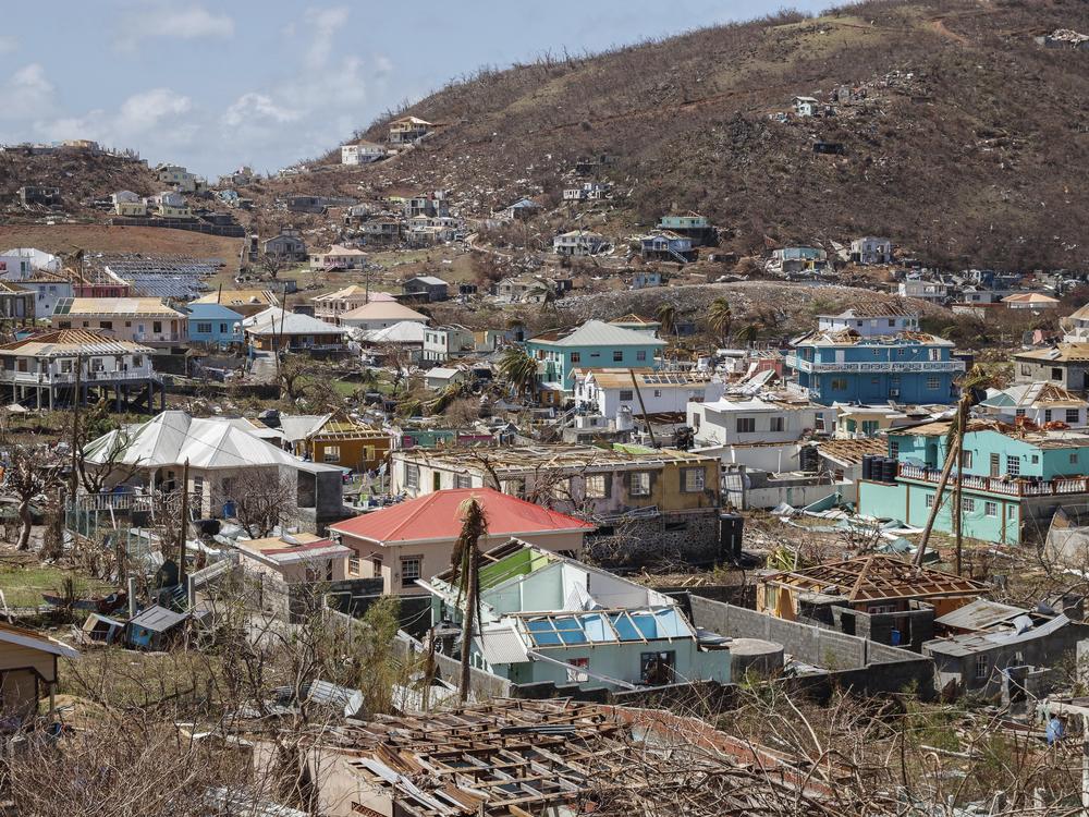 Homes destroyed by Hurricane Beryl lie in Clifton, Union Island, St. Vincent and the Grenadines, on Thursday.