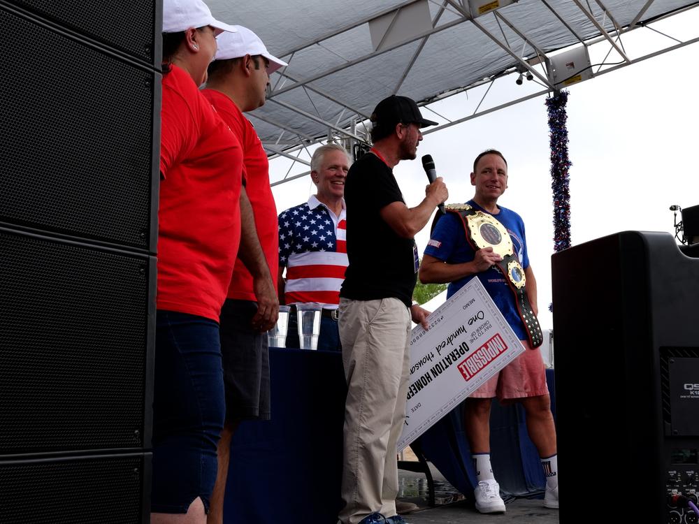 Joey Chestnut, banned from Coney Island, takes his hot dogeating