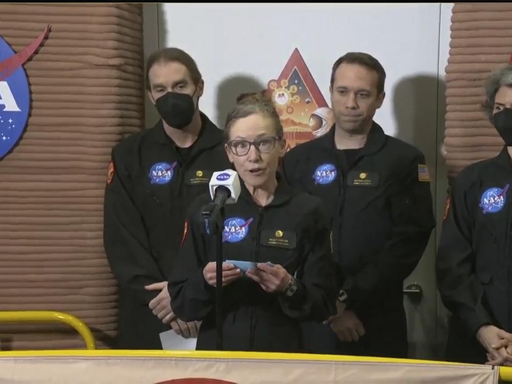 In this image made from video provided by NASA, CHAPEA commander Kelly Haston speaks in front of other crew members at Johnson Space Center in Houston, Texas, on Saturday.
