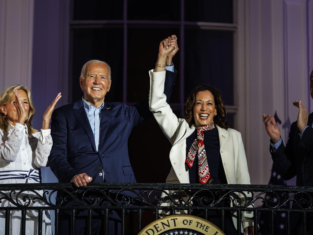 President Biden and Vice President Harris view the fireworks on the National Mall from the White House balcony on July 4, 2024.