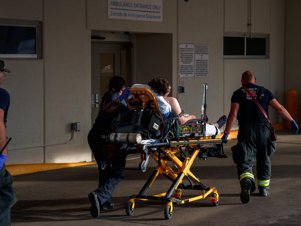 Sunland Park Fire Department rushes a 21-year-old Mexican man suffering from heat-related illness into the emergency room at Las Palmas Medical Center in El Paso, Texas, on Saturday, June 29, 2024. 