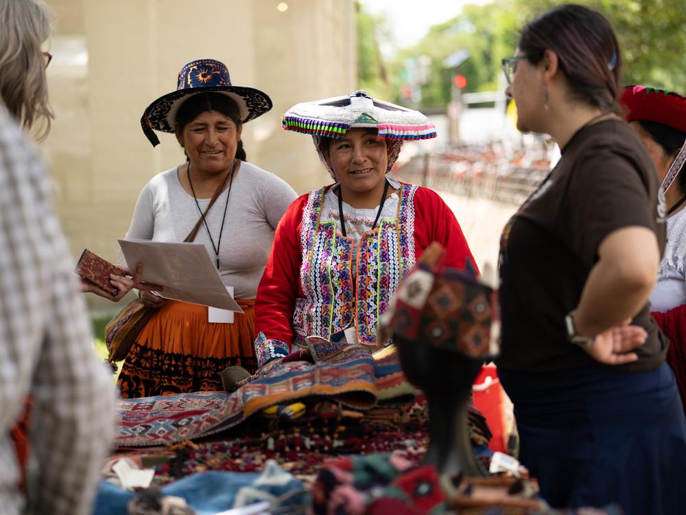  Master weavers from Peru wear their creations as they demonstrate the art of weaving at the Folklife Festival.