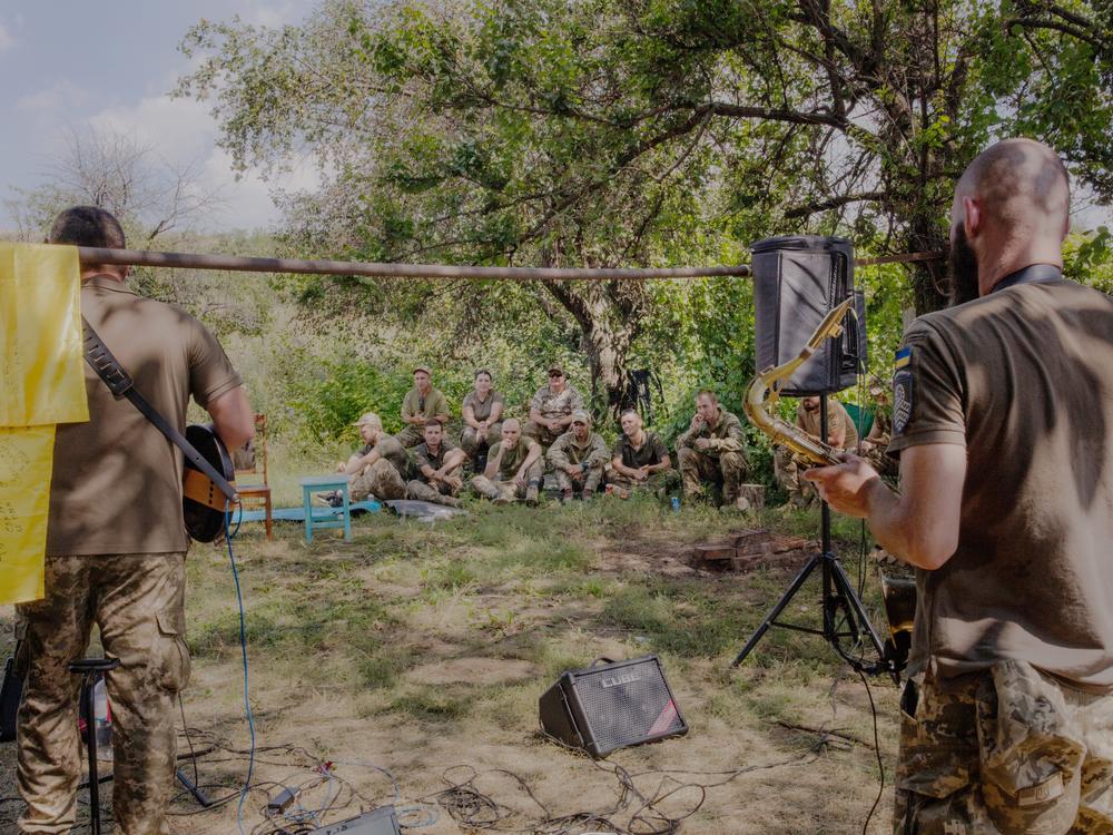 A band of soldiers plays a concert for soldiers near the front lines in eastern Ukraine’s Donbas region.